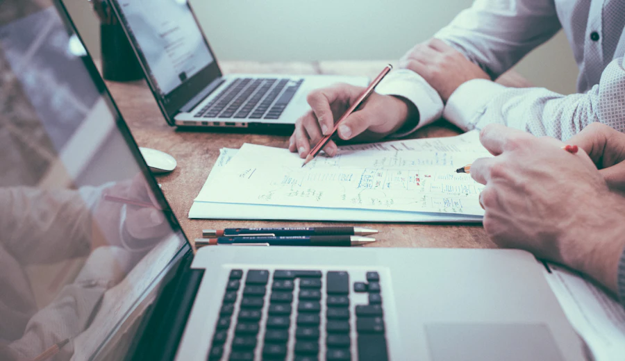 Custom real estate software development on a laptop